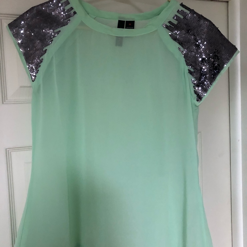 Sheer mint green top with sparkled shoulders